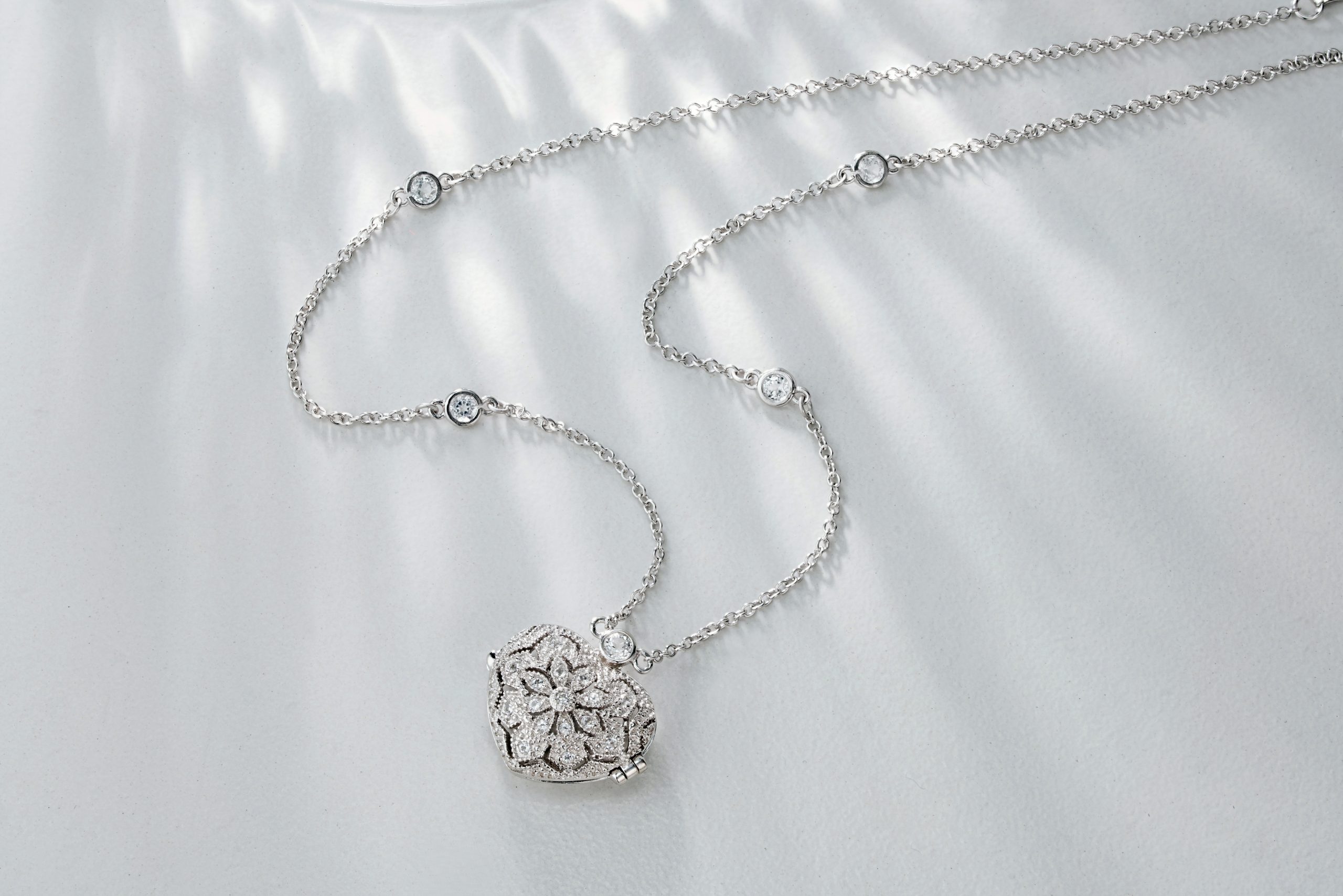 Silver heart locket necklace